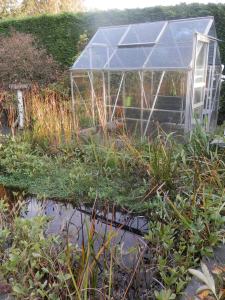 Kas winterklaar maken. Moestuin.